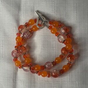Handcrafted “The Orange Bracelet” Sz 7.5”